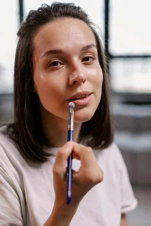 a woman brushing her teeth with a toothbrush, a hyperrealistic painting, trending on pexels, hyperrealism, wearing professional makeup, academic painting, holding pencil, smooth chin