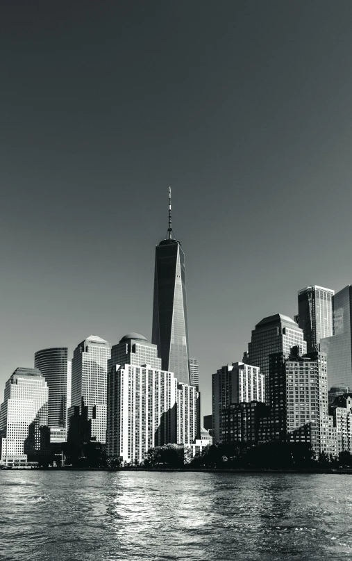 a black and white photo of a city skyline, bright sunny day, 9/11, shot on sony a 7, instagram picture