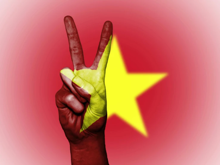 a person holding up a peace sign in front of a star, stuckism, vietnam, red and yellow, avatar image, square