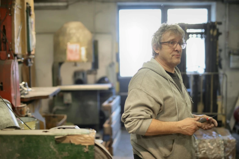 a man that is standing in a room, a portrait, arbeitsrat für kunst, manufacturing, prop design, avatar image, profile image