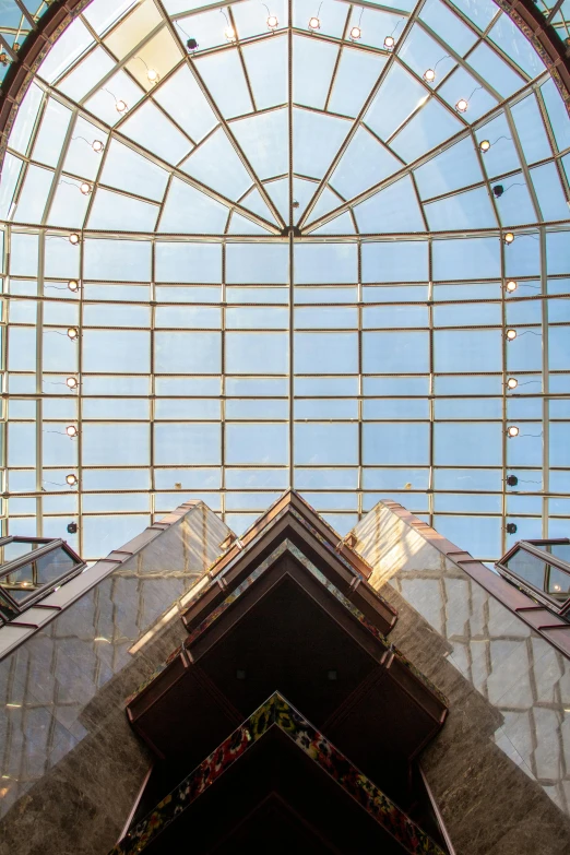 a picture of the inside of a building, inspired by Hans Mertens, symmetrical crown, skylights, transparent