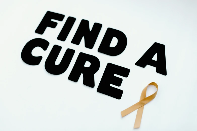 a sign that says find a cure with a yellow ribbon, a picture, (light orange mist), profile image, uncropped, mundane