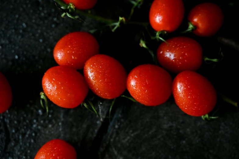 a bunch of tomatoes sitting on top of a table, profile image, shot on sony a 7, rain lit, avatar image