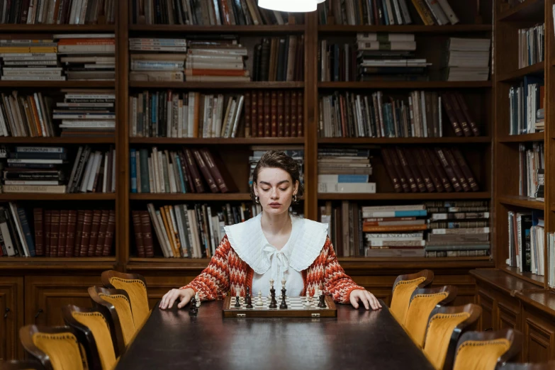 a woman playing a game of chess in a library, a portrait, by Emma Andijewska, unsplash, mannerism, erwin olaf, maisie williams, board games on a table, cinematic outfit photo