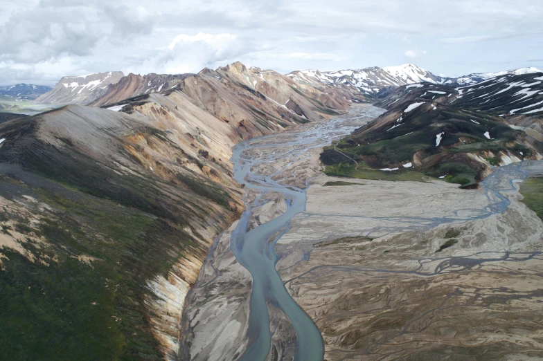 an aerial view of a river running through a valley, by Jessie Algie, unsplash contest winner, hurufiyya, polar, landslides, structural geology, july 2 0 1 1