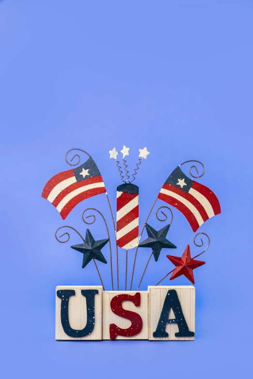 a wooden block with the word usa written on it, an album cover, by Alison Geissler, shutterstock contest winner, flags, pyrotechnics, art toys on a pedestal, united states air force
