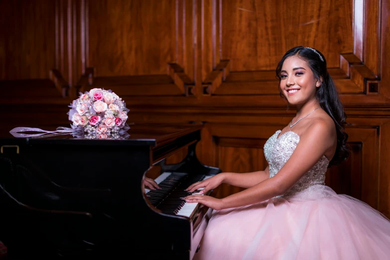 a woman in a wedding dress sitting at a piano, avatar image, isabela moner, high school, professional photo-n 3