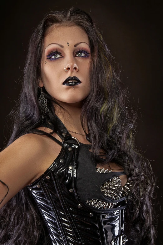 a woman in a black corset posing for a picture, an album cover, trending on deviantart, wearing war paint, techno mystic goddess, trending photo, taken in the late 2010s
