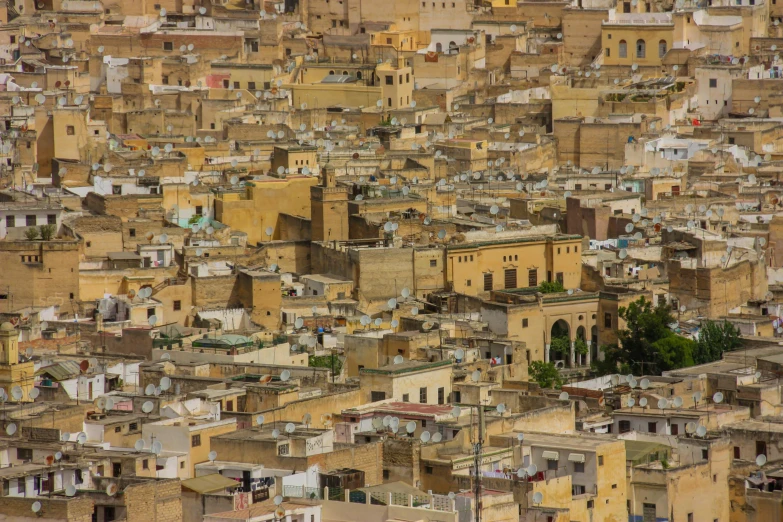 a view of a city from the top of a hill, pexels contest winner, renaissance, moroccan, beige, mass housing, zoomed in