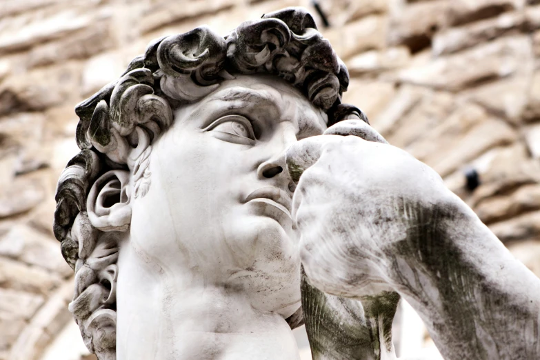 a close up of a statue of a man, inspired by Michelangelo Buonarotti, trending on pexels, the kiss, bird view, grey, florence