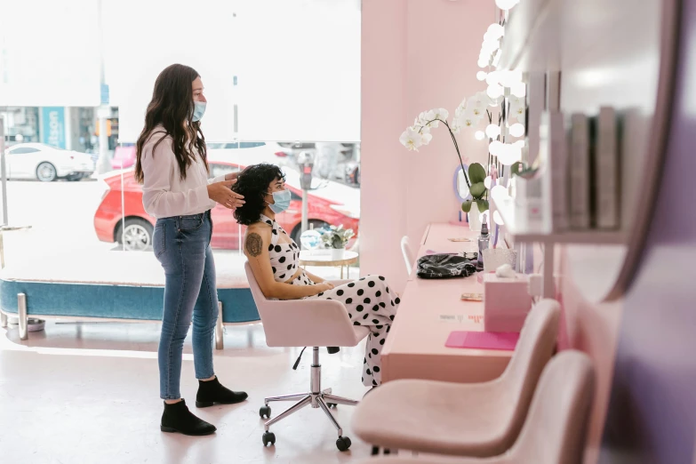 a woman getting her hair done in a salon, by Olivia Peguero, pink accents, manuka, a wide shot, profile image