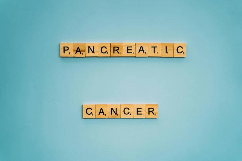 wooden scrabbles spelling pancreatic cancer on a blue background, an album cover, by Lynn Pauley, pexels, office ceiling panels, the panorama, anaesthetic, engraved