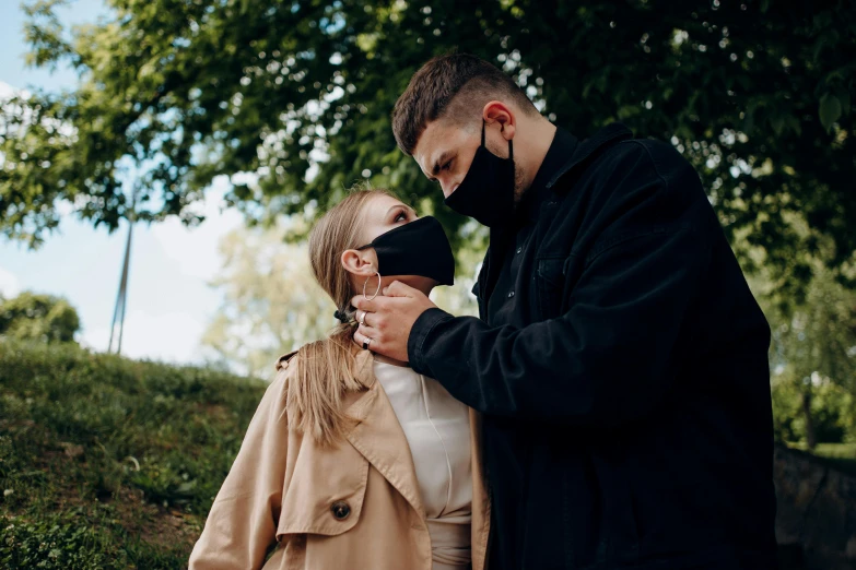 a man and a woman standing next to each other, trending on pexels, romanticism, bag - valve mask, thumbnail, outdoor photo, pokimane