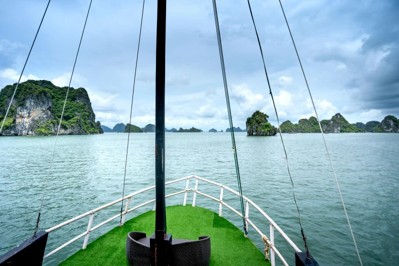 a view of a body of water from a boat, lê long, fan favorite, green waters, adventurer