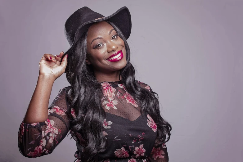 a woman with long black hair wearing a hat, by Jeka Kemp, pexels, happening, smiling fashion model, ( ( dark skin ) ), singer in the voice show, modelling
