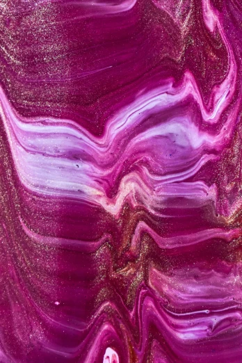 a close up of a piece of art on a table, inspired by Julian Schnabel, reddit, abstract art, jelly - like texture, quinacridone magenta, metallic galactic, striations