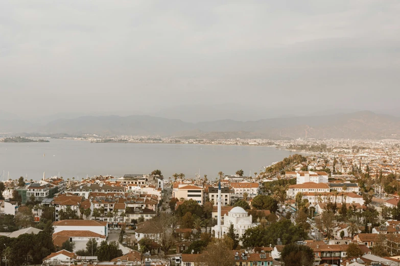 a view of a city from the top of a hill, sea in the background, 1 petapixel image, lightroom preset, turkey