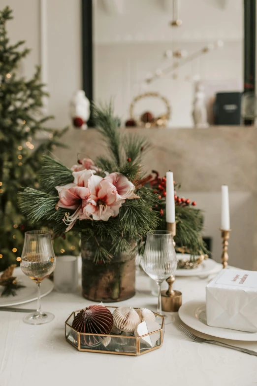 a white table topped with a vase filled with flowers, unsplash, baroque, christmas, indoor scene, boys, blushing