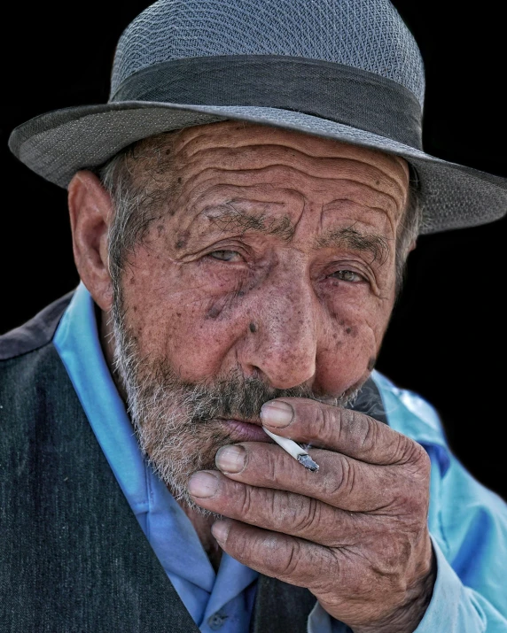 a man with a hat smoking a cigarette, a colorized photo, pexels contest winner, hyperrealism, some wrinkled, an afghan male type, lgbtq, gray men