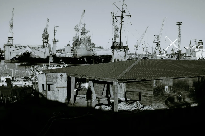 a black and white photo of a harbor, fantastic realism, soviet yard, outlined silhouettes, photograph taken in 2 0 2 0, photography”