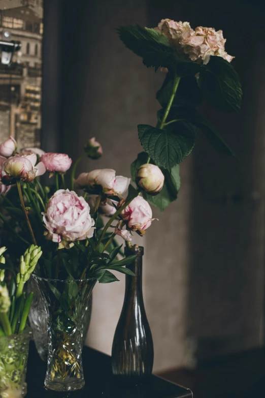 a couple of vases sitting on top of a table, a still life, unsplash, romanticism, peony flowers, multiple stories, zoomed in, exquisite floral details