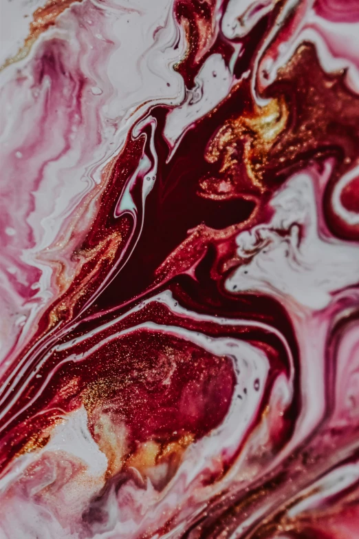 a close up of a red and white marble, inspired by Julian Schnabel, trending on pexels, abstract art, wine, dessert, magenta, swirly