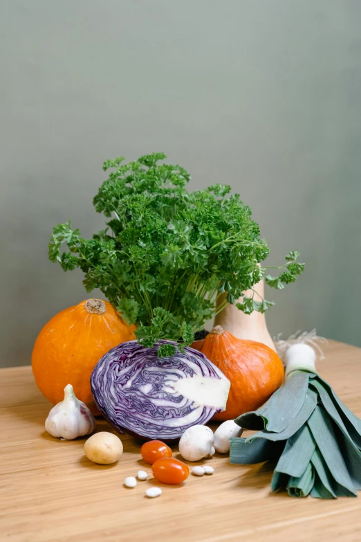 a bunch of vegetables sitting on top of a wooden table, renaissance, purple foliage, slide show, product shot, petite