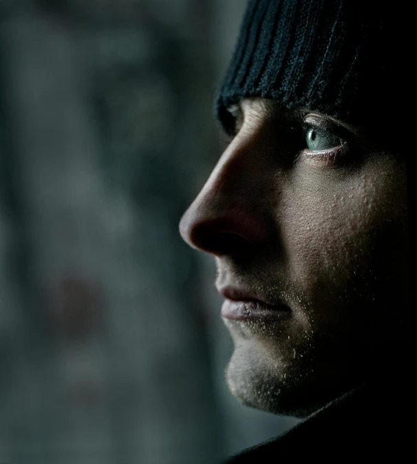 a close up of a person wearing a hat, a character portrait, by Tobias Stimmer, unsplash, digital art, still from the movie 8 mile, trent reznor, window light, angle profile portrait