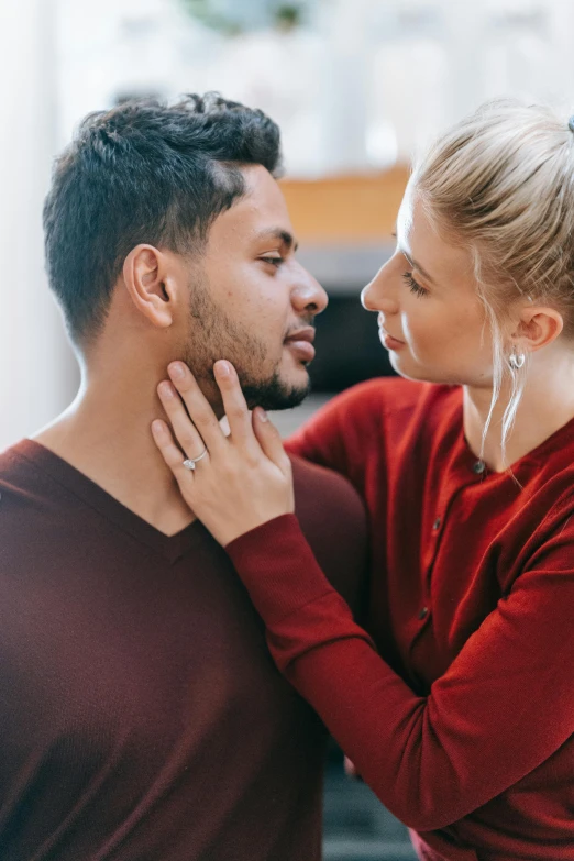 a man and woman standing next to each other, trending on pexels, renaissance, neck zoomed in from lips down, mixed race, comforting, manly