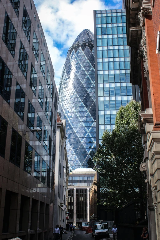 the gherni building towering over the city of london, glass domes, view from the street, square, 2019 trending photo