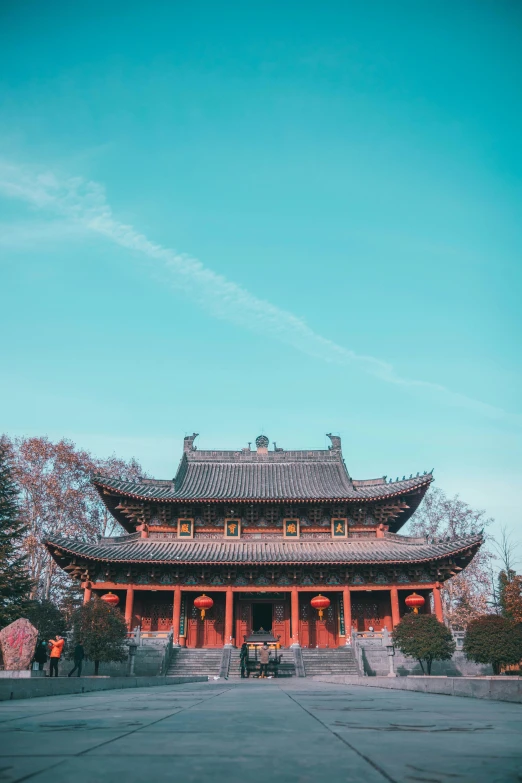 a large building sitting in the middle of a park, inspired by Wang Yi, pexels contest winner, chinese costume, clear sky above, square, colorful aesthetic