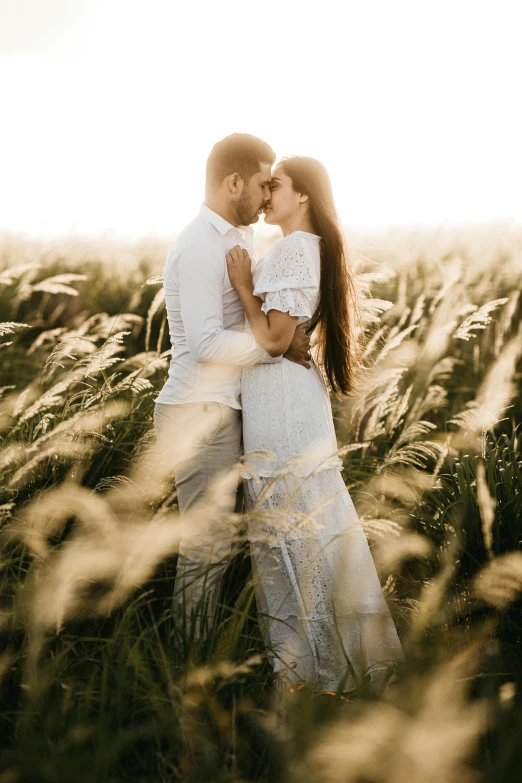 a couple kissing in a field of tall grass, pexels contest winner, romanticism, soft light 4k, 15081959 21121991 01012000 4k, instagram post, white