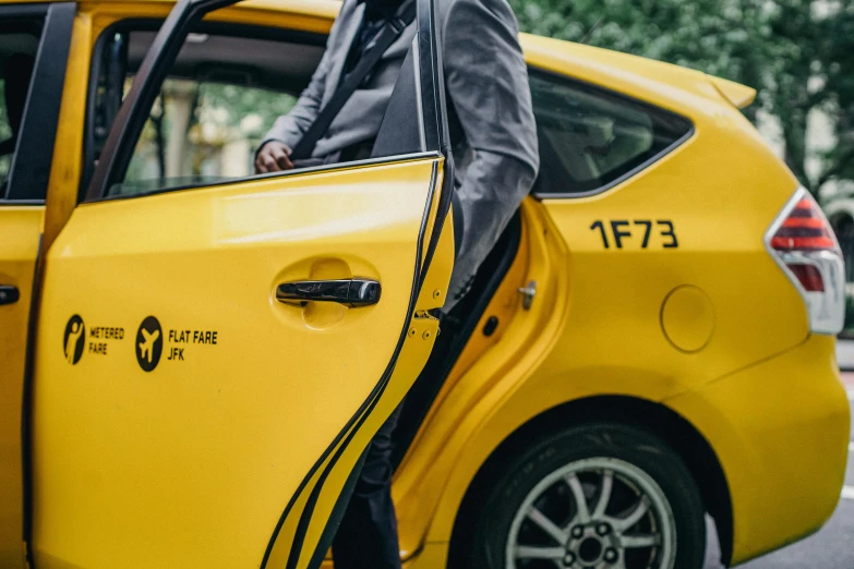 a man getting out of a taxi cab, pexels contest winner, yellow and black trim, avatar image, close up shot from the side, promotional photo