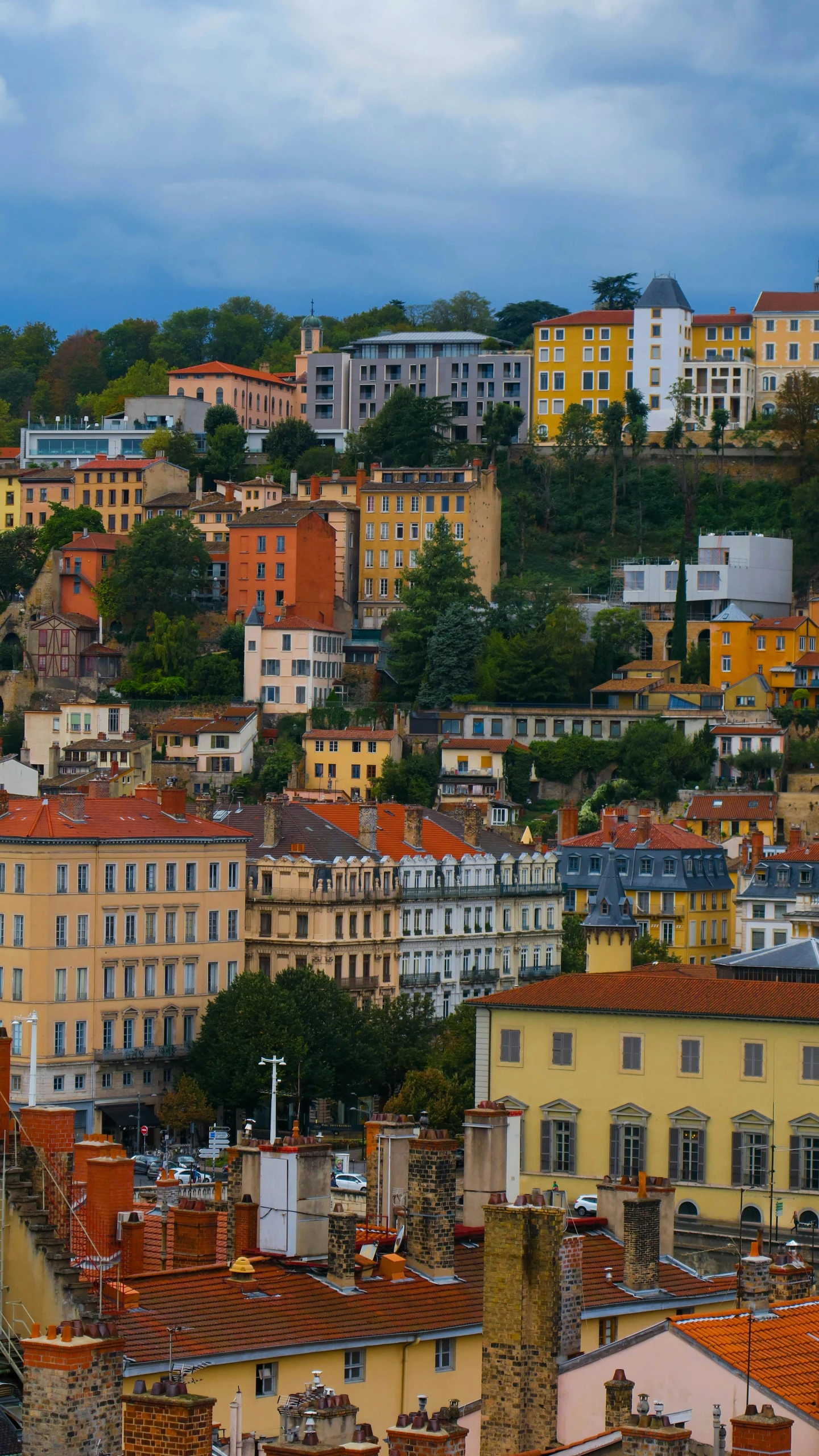 a view of a city from the top of a hill, inspired by Raoul Dufy, shutterstock, zoomed out shot, bizzaro, france, exterior