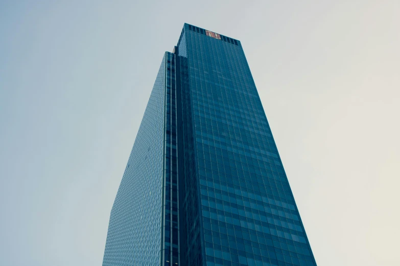 a very tall building with a lot of windows, inspired by Richard Wilson, unsplash, gutai group, clear sky above, uhq, exterior wide shot, eminem