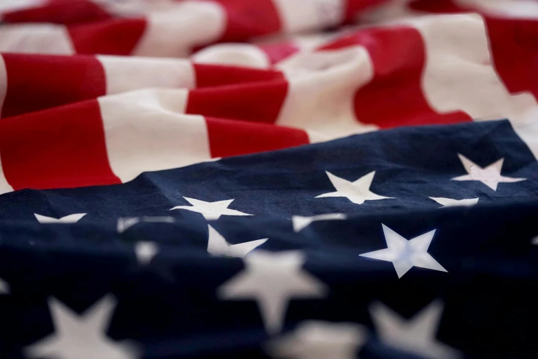 a close up of a red, white and blue american flag, unsplash, symbolism, multiple stories, us army, getty images, video