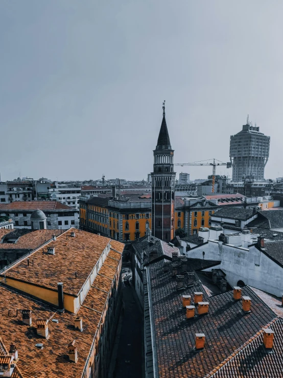 a view of a city from the top of a building, an album cover, inspired by Bernardo Bellotto, pexels contest winner, renaissance, lead - covered spire, low quality photo, today\'s featured photograph 4k, milan jozing