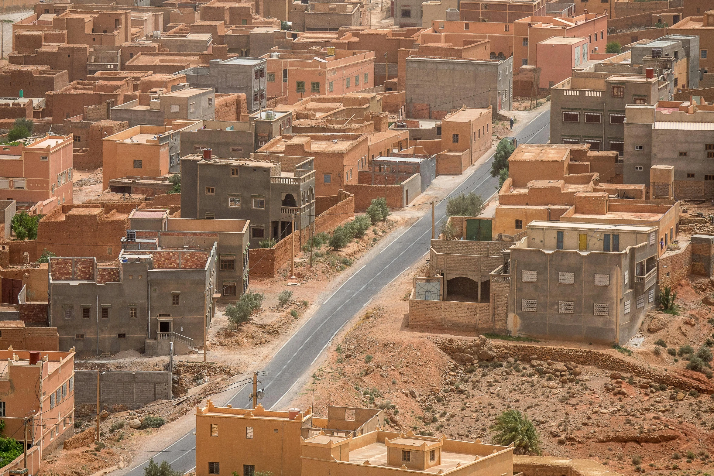 an aerial view of a small town in the desert, pexels contest winner, les nabis, mud and brick houses, helio oiticica, photograph of the city street, hyperrealism photo