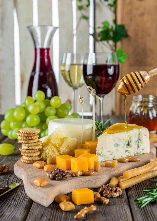 a wooden cutting board topped with cheese and crackers, shutterstock contest winner, renaissance, wine cellar full of food, honey, trio, promo image