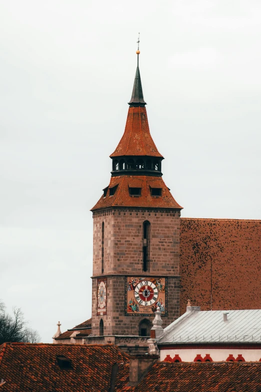 a large building with a clock on the front of it, by Jakob Gauermann, romanesque, red roofs, lead - covered spire, tula, patterned