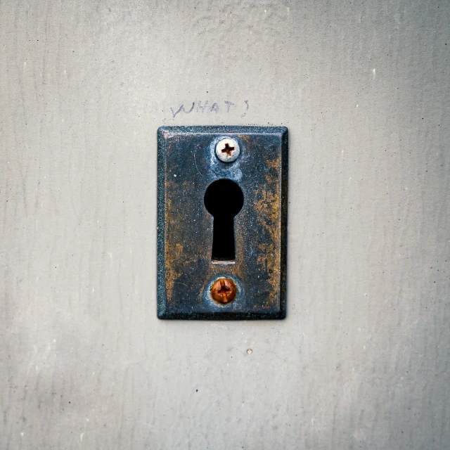 a close up of a keyhole on a wall, by Jan Kupecký, unsplash, conceptual art, miscellaneous objects, listing image, hardware, artwork