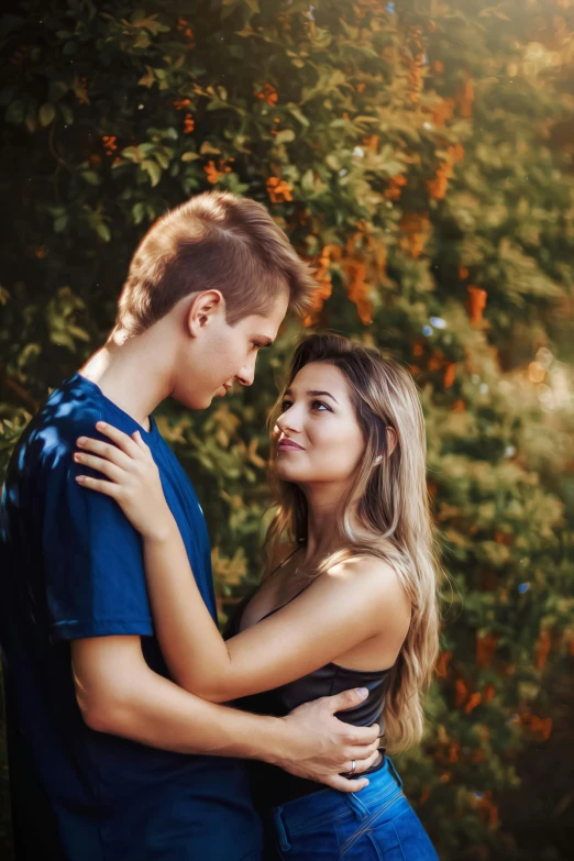 a man and a woman standing next to each other, pexels contest winner, handsome girl, with soft bushes, caspar david, teen