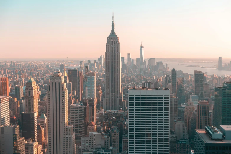 a view of a city from the top of a building, by Gavin Hamilton, pexels contest winner, modernism, new york skyline, background image