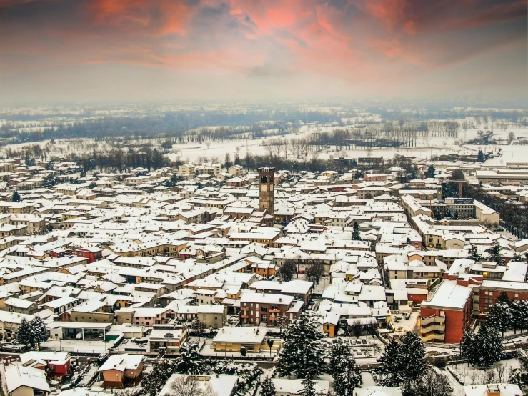 an aerial view of a city covered in snow, an album cover, inspired by Bernardo Bellotto, pexels contest winner, renaissance, snowy apennines, thumbnail, square, panoramic