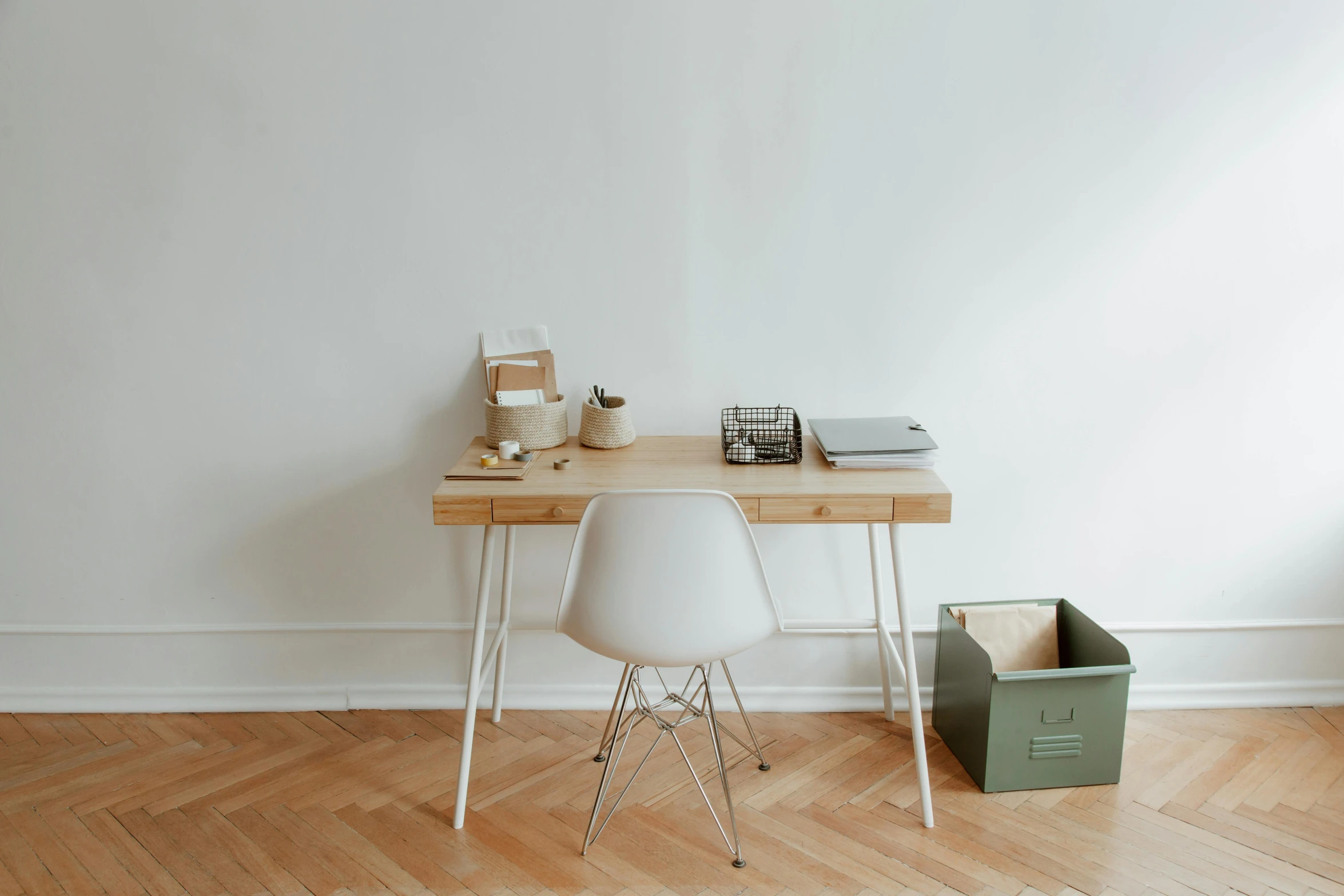 a wooden desk sitting on top of a hard wood floor, unsplash, minimalism, white color scheme, two plastic chair behind a table, julian ope, full - shot