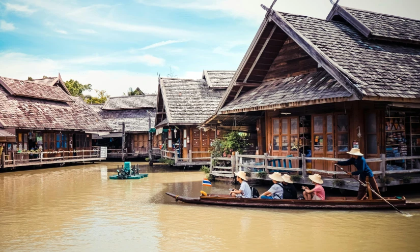 a group of people riding on top of a boat, pexels contest winner, wooden houses, 💋 💄 👠 👗, in style of thawan duchanee, square