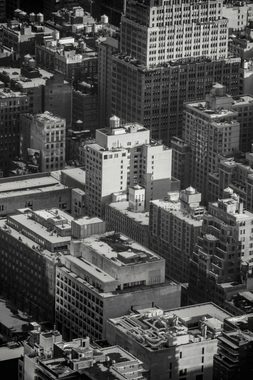 a black and white photo of a city, inspired by Thomas Struth, unsplash contest winner, modernism, square, high view, new york buildings, 8 k detailed photograph