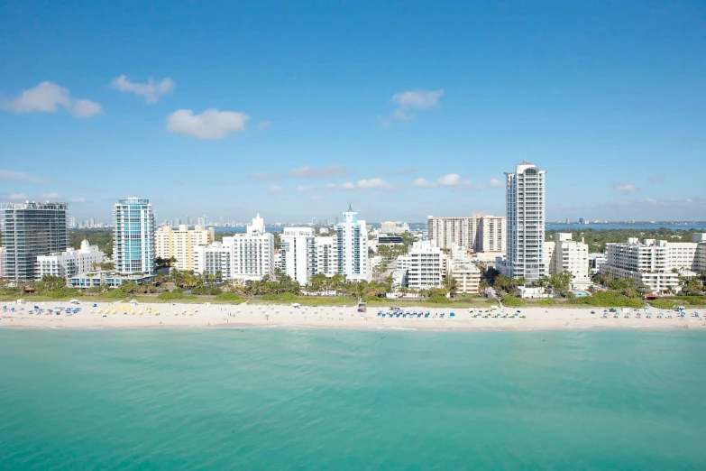 a large body of water next to a beach, by Jason Benjamin, pexels contest winner, hurufiyya, miami beach, whitewashed buildings, ultra wide angle isometric view, youtube thumbnail