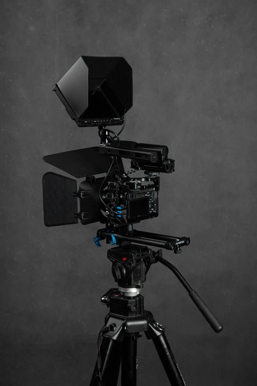 a camera sitting on top of a tripod, production quality cinema model, nd 6, dark setup, tilted 35° frame