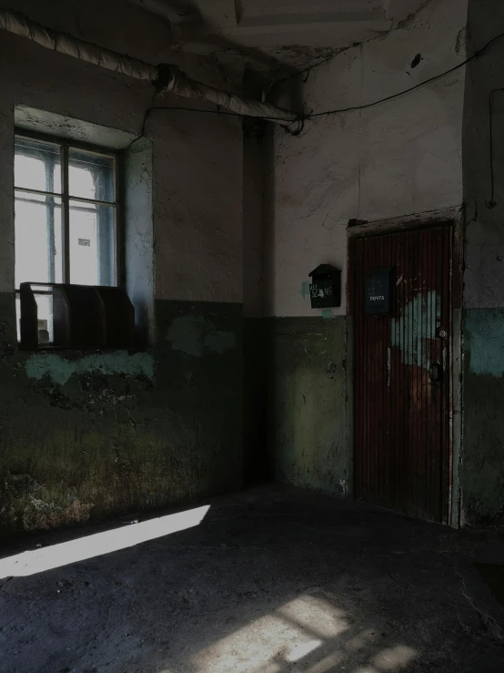 an empty room with a door and a window, an album cover, unsplash contest winner, arte povera, soviet yard, natural prison light, background image